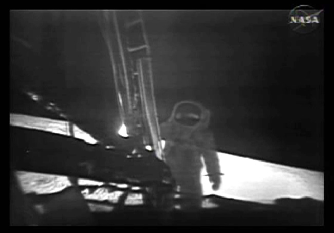 This photo, from NASA TV, shows one of the Apollo 11 astronauts on the lunar surface after landing from a new digitally refurbished version of the original moon landing video unveiled in Washington Thursday, July 16, 2009. After NASA couldn't find its original videotapes, NASA and a Hollywood film restoration company took television video copies of what Apollo 11 beamed to Earth on July 20, 1969, and made the pictures look sharper.(AP Photo/NASA TV)